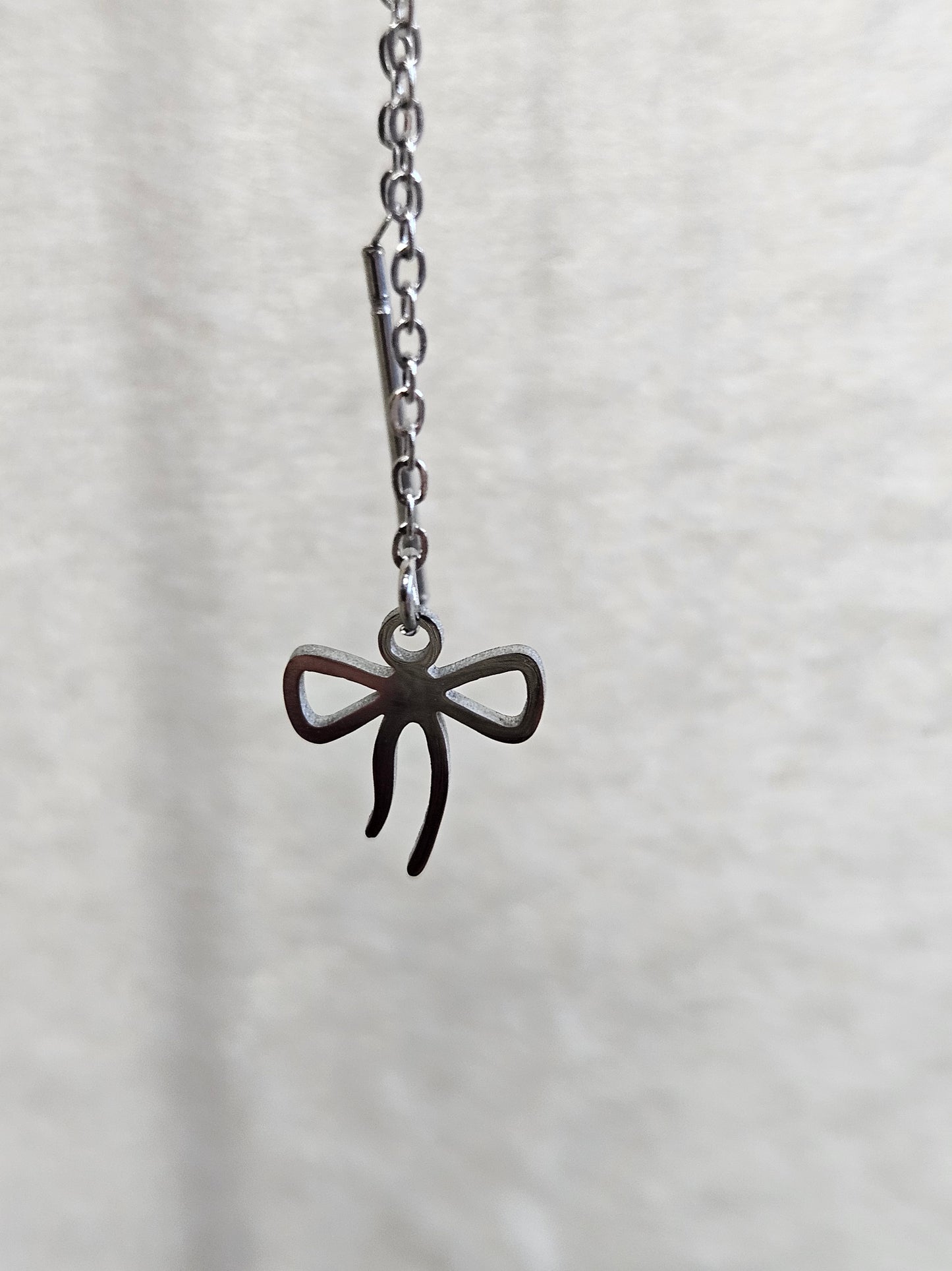 Boucles d'oreilles pendantes "Ruban argenté"
